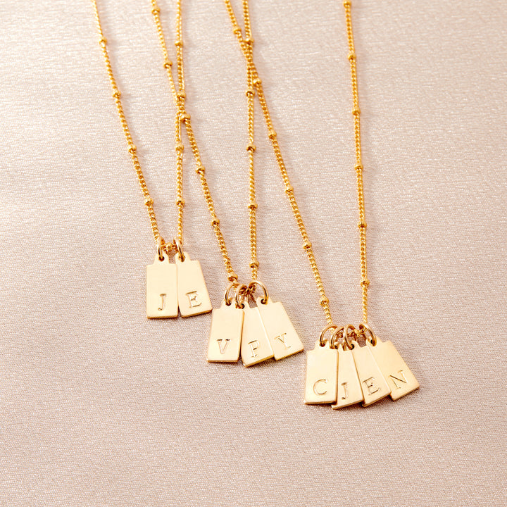 Madeline Rectangle Four Initial Pendant