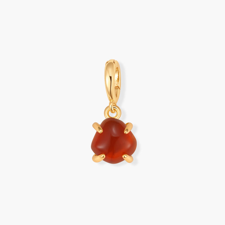 Gold-tone Mabel Birthstone Charm with a deep red carnelian cabochon set in a claw setting, suspended from a ring clasp.