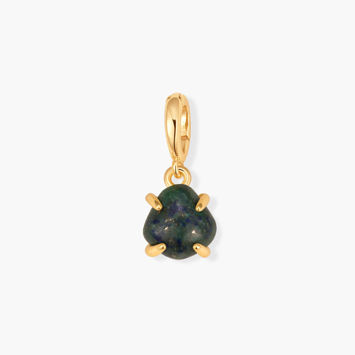 Mabel Birthstone Charm with a tumbled green stone set in six prongs, suspended from a ring clasp.