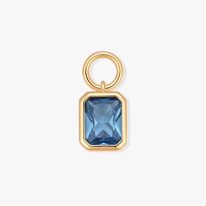 Vivienne Emerald Birthstone Charm with a blue rectangular bezel-set stone and ring clasp.