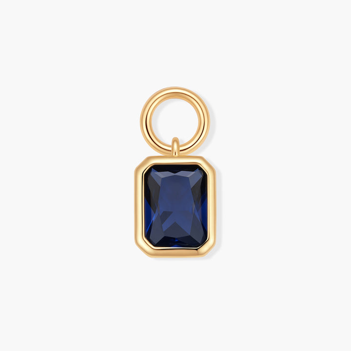Vivienne Emerald Birthstone Charm with a bezel-set rectangular navy blue stone and a ring clasp.