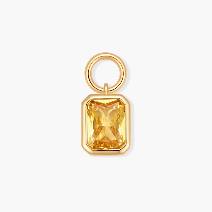 Vivienne Emerald Birthstone Charm with a bezel-set rectangular yellow citrine stone and a ring clasp.