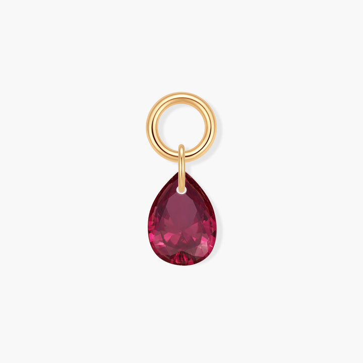 Vivienne Teardrop Birthstone Charm with a pear-cut pink-red stone suspended from a ring clasp.