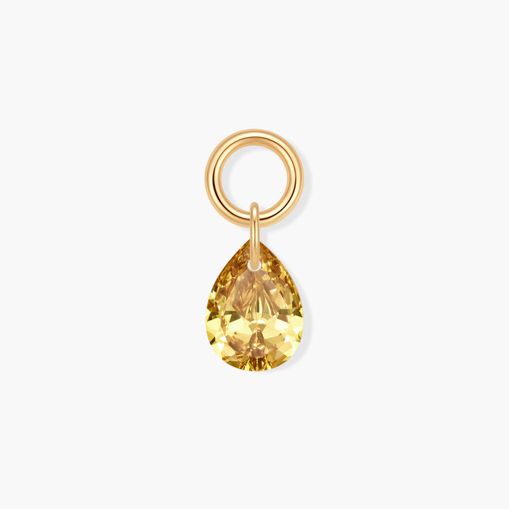 Vivienne Teardrop Birthstone Charm with a faceted yellow pear-shaped stone suspended from a ring clasp.