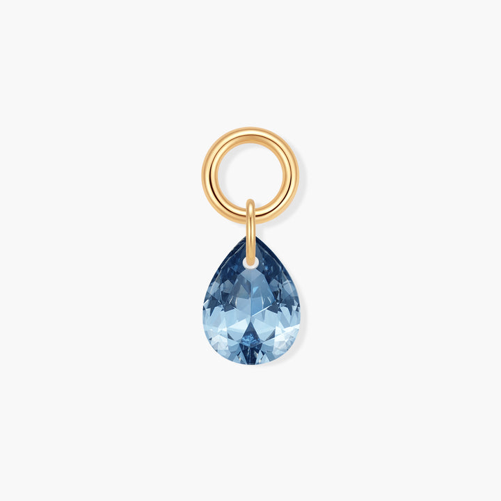 Vivienne Teardrop Birthstone Charm with a faceted blue pear-shaped stone suspended from a ring clasp.