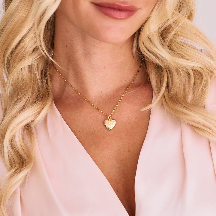 gold paperclip chain necklace with heart charm locket on women&